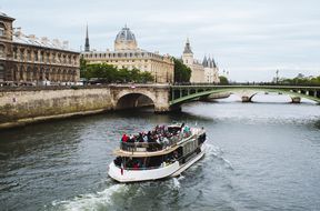 Tour boat cruising down the SEine