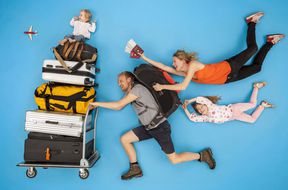 Family hurrying for a plane departure